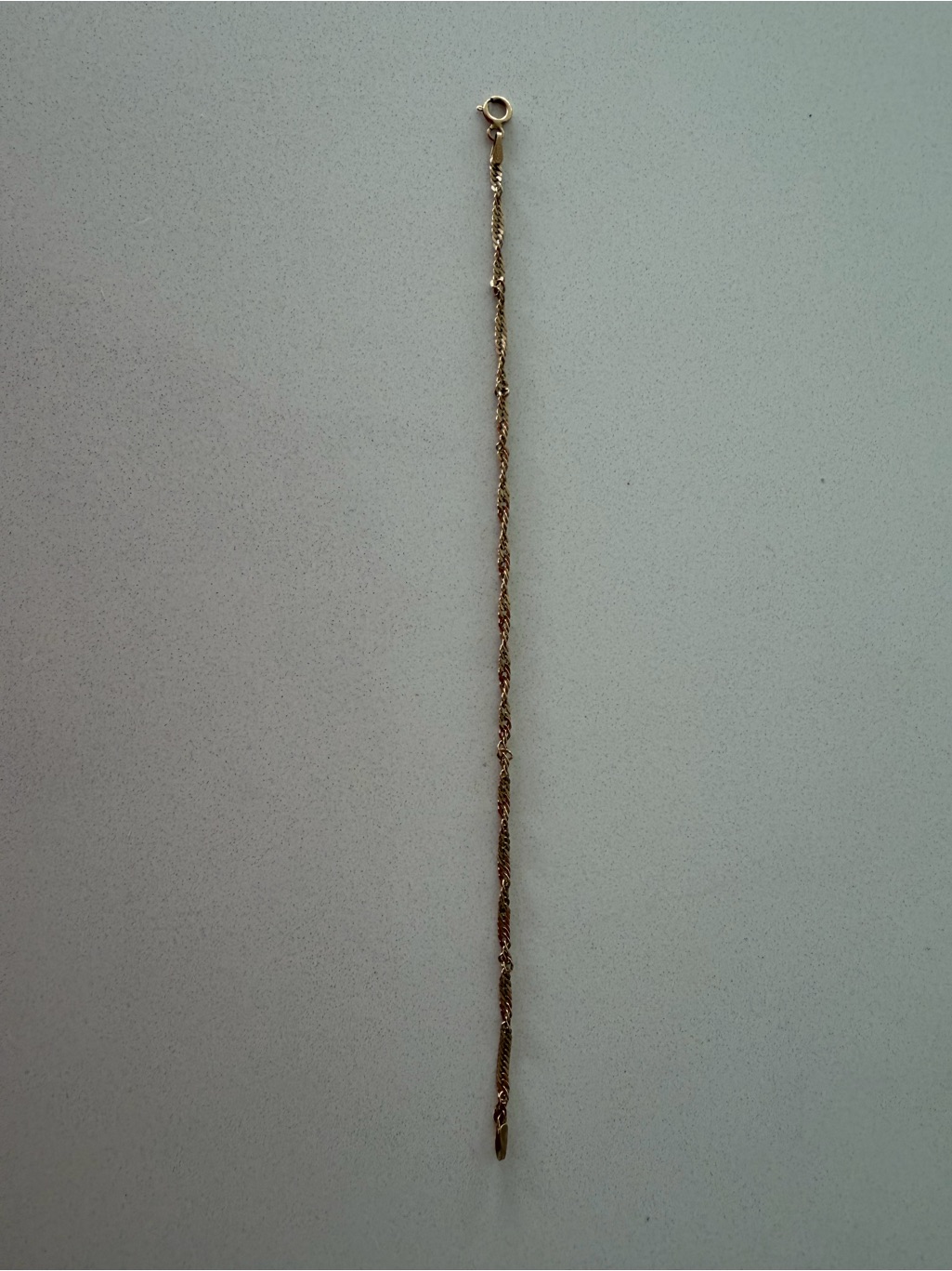 7&acirc; Singapore 14kt Gold Bracelet